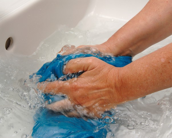 washing clothes in sink 